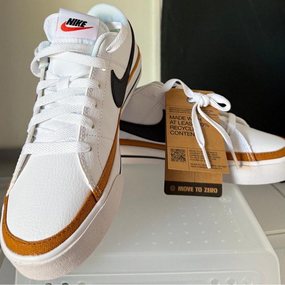 Nike White Sneakers with Orange and Black Accents